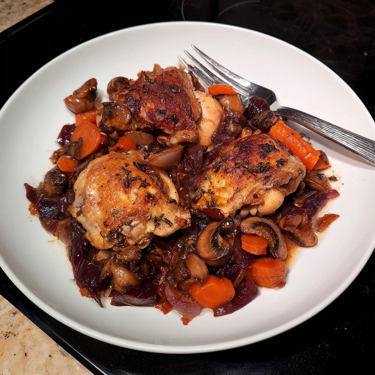 Slow Cooker French Wine Chicken: Browned thighs in a rich red wine, herb sauce.
