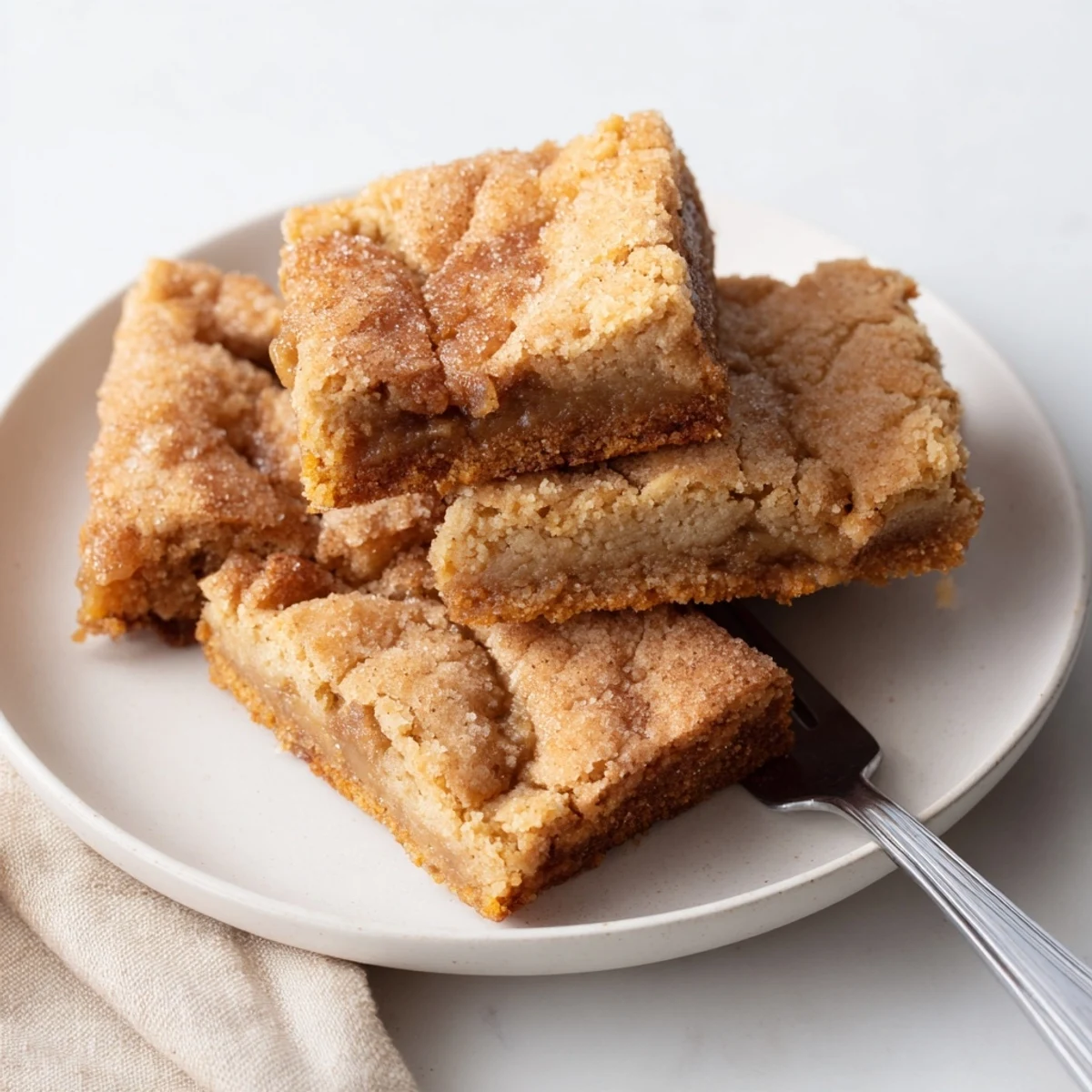 Decadent cinnamon sugar apple butter blondies, served warm with a scoop of ice cream.