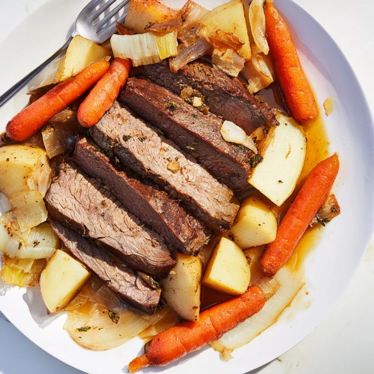 Tender Sunday Pot Roast simmered to perfection, surrounded by colorful, roasted veggies.  