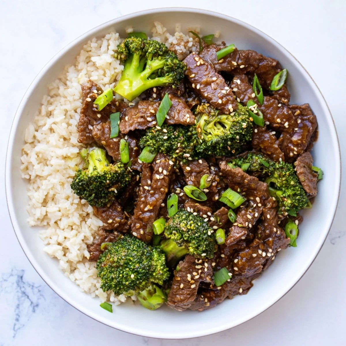 Steaming bowl of Slow-Cooker Beef & Broccoli: a complete, comforting meal perfect for a weeknight dinner.