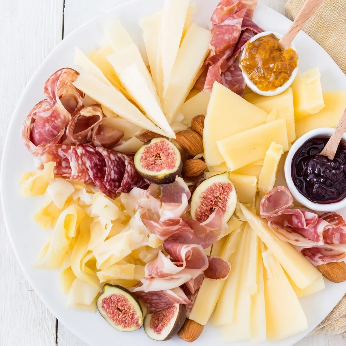 A gorgeous Wine & Food Pairing Platter, laden with cheese, charcuterie, and colorful fruits, perfect for guests.