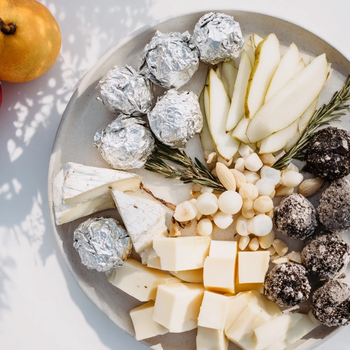 Get ready for movie night! This The Silver Screen board offers truffle brie, white cheddar, and delicious sweet accompaniments.