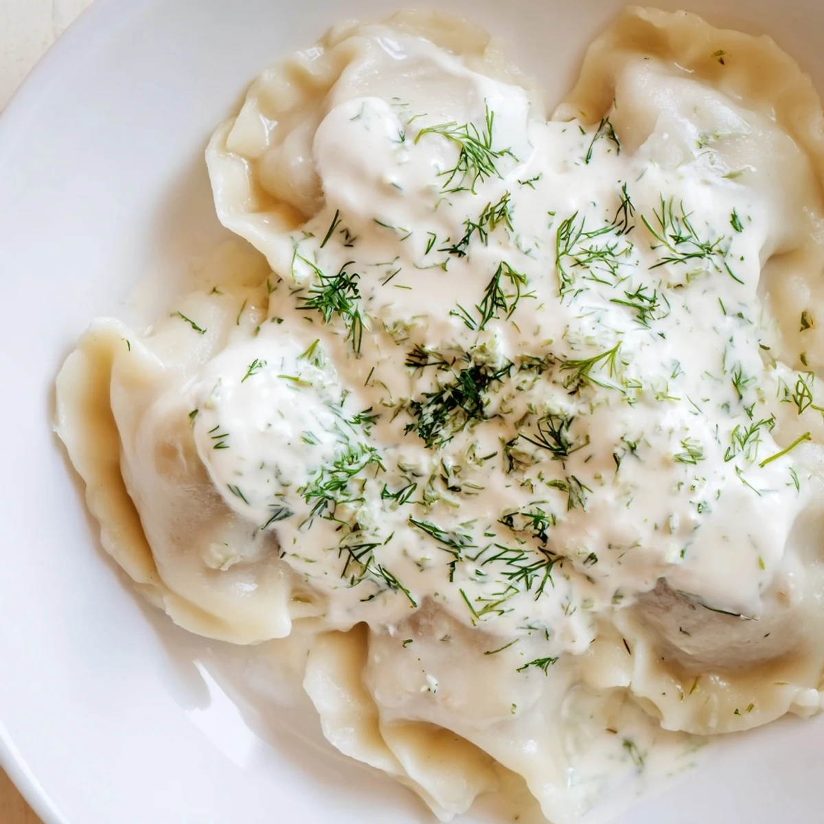 Close-up of freshly made Russian pelmeni, demonstrating delicious, flavorful meat filling ready to enjoy.