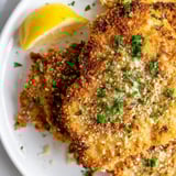 Imagine the amazing crunch: crispy Parmesan chicken cutlets, ready with lemon and fresh herbs!