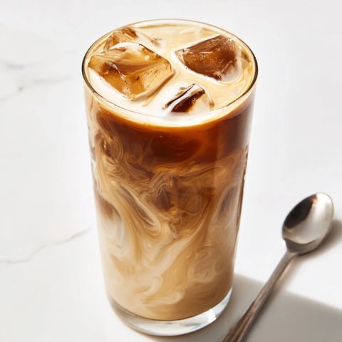 Rich, creamy Tahini Iced Coffee served over ice for a refreshing summer treat.  