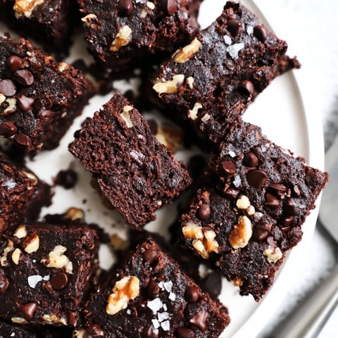 Decadent zero-waste brownies using nut-milk pulp, topped with chocolate chips.  