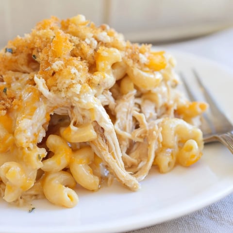 Creamy Classic Mac & Cheese with BBQ Chicken, bubbling with cheese and smoky flavor.