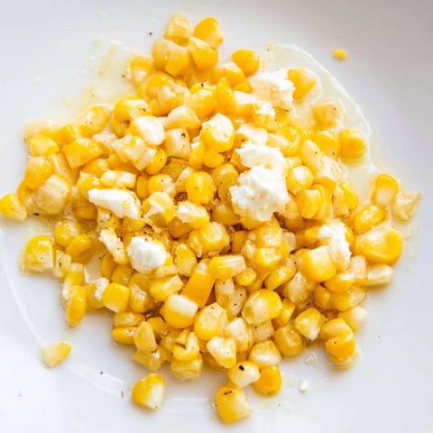 Golden, caramelized Honey Butter Skillet Corn glistening from the skillet, ready to serve and enjoy.