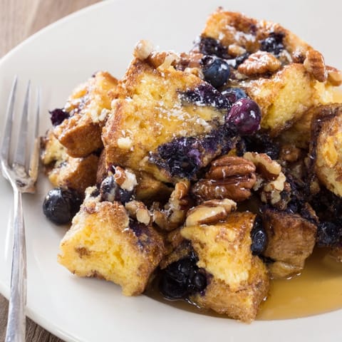 Baked Protein Blueberry French Toast: a fluffy, protein-packed breakfast with bursts of juicy blueberries.