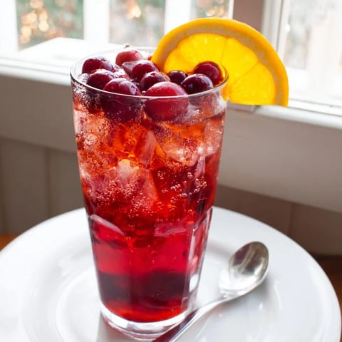 Refreshing 3-Ingredient Holiday Punch served in a chilled punch bowl, ideal for holiday parties.