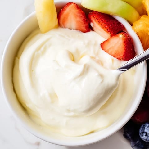 A sweet and easy cream cheese fruit dip: a party favorite with vibrant, fresh fruit.