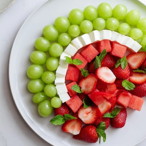 This Summer Watermelon Slice recipe features juicy watermelon, sweet strawberries, with creamy mozzarella.