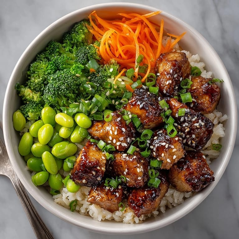 Sizzling Chicken Teriyaki Rice Bowl, imagine juicy chicken atop a flavorful bed of rice.