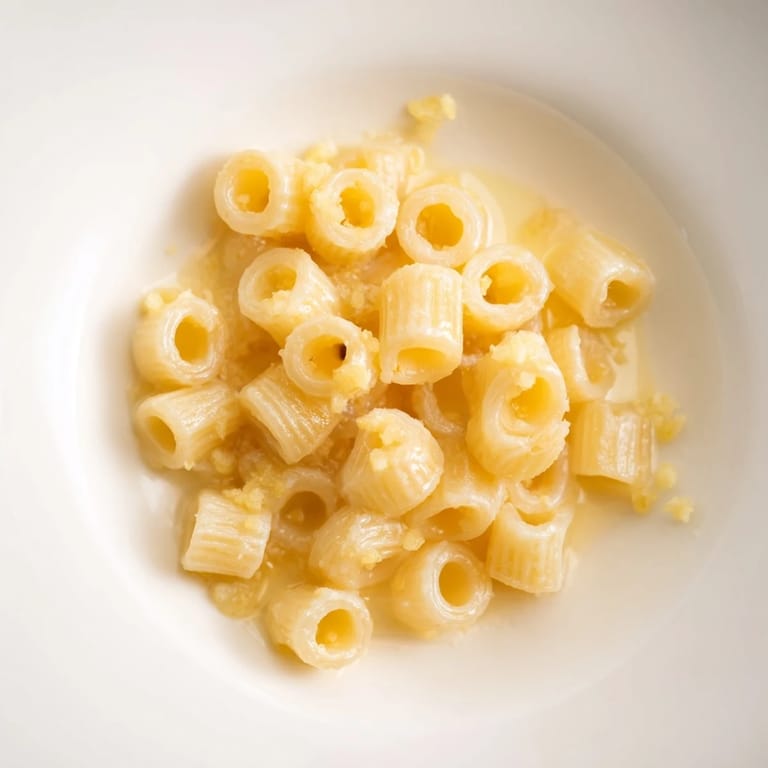 A close-up of steaming 3-ingredient butter & garlic ditalini, perfect for a quick dinner.