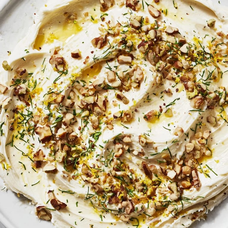 Enjoy a tempting close-up of this butter board charcuterie, a perfect vegetarian appetizer, ready for dipping.